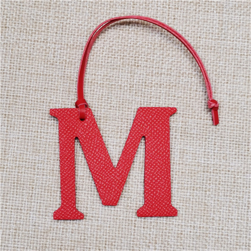 XMESSUN 新しい英語文字 M チャーム高級本物の天然皮 - Monogram Keychain Leather のレビューと価格